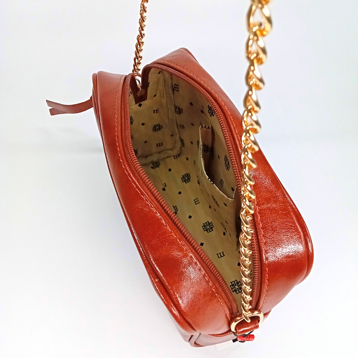 Dámska hnedá lesklá prešívaná crossbody kabelka Monnari