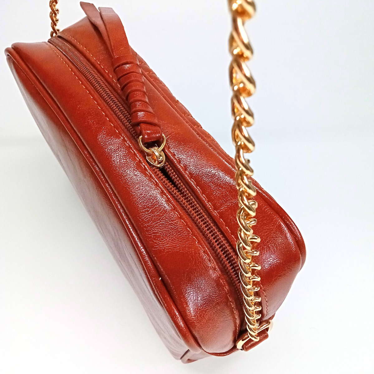 Dámska hnedá lesklá prešívaná crossbody kabelka Monnari