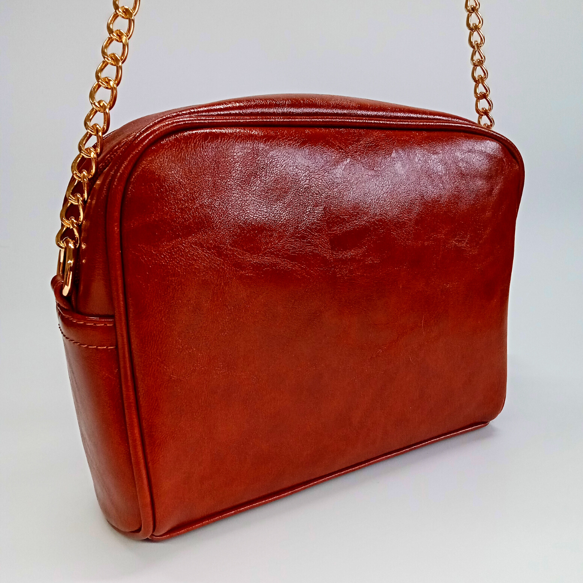 Dámska hnedá lesklá prešívaná crossbody kabelka Monnari