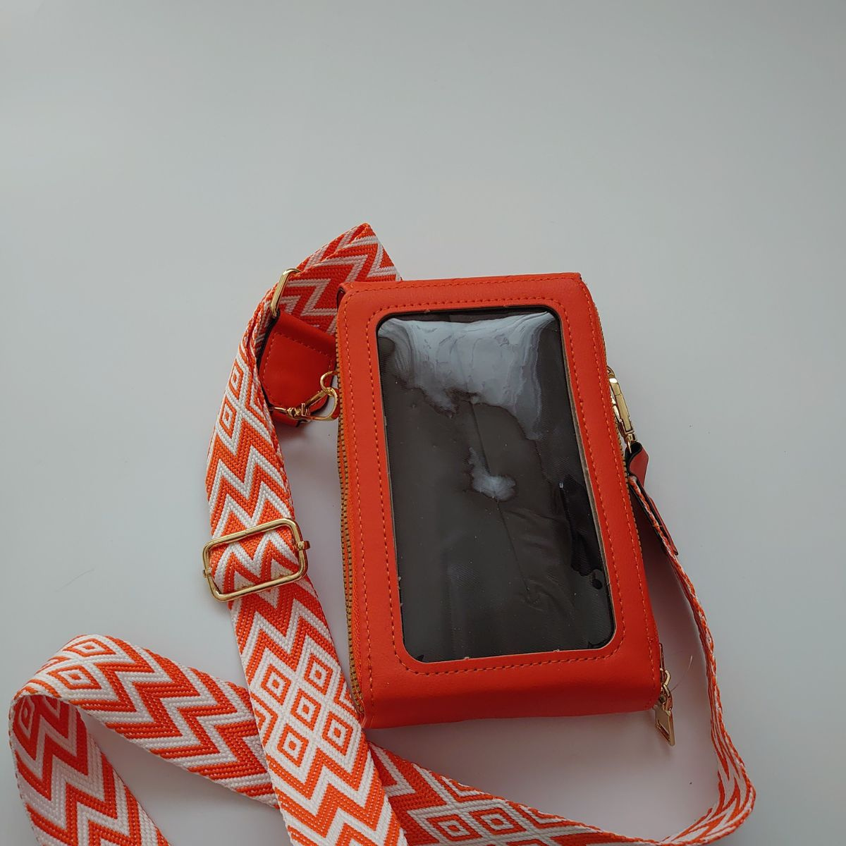 Dámska oranžová kabelka na mobil ALDEA