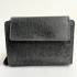 Dámska kožená sivočierna peňaženka s pleteným zdobením