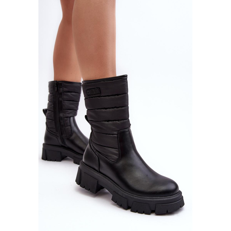 Snehové topánky izolované čiernou veľkou hviezdou MM274068